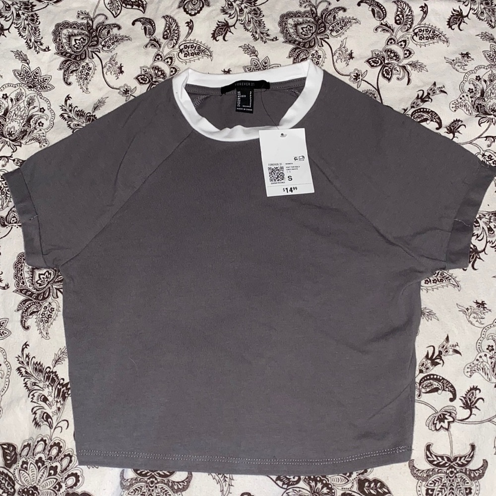 Selling forever 21 crop top size S color grey and white